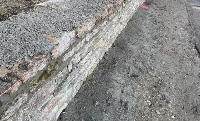 Démontage et remontage d un mur en pierre à Laives sas Ravat Charbonnier 